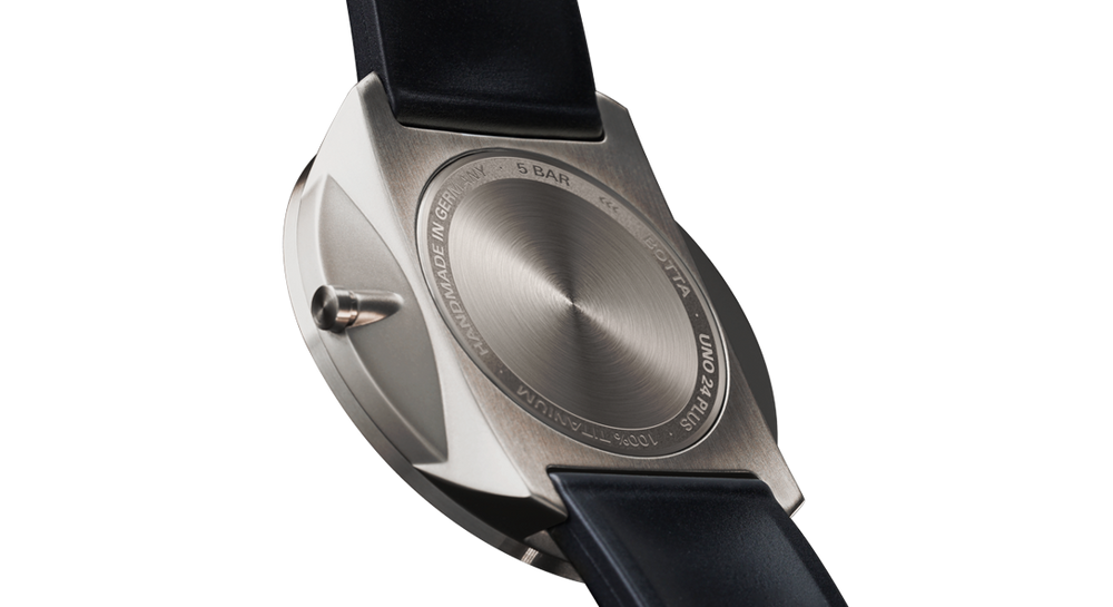 Three-zone titanium housing with screwed back