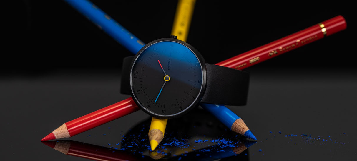 TRES colores BAUHAUS-Uhr von BOTTA